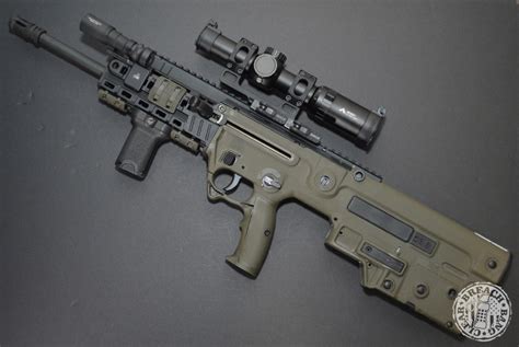 trigger pull, repositioning of the ambidextrous mag release to an AR-15 location, a forearm with Picatinny rails at the 3, 6, and 9 o'clock positions with removable rail covers. . Tavor x95 accessories